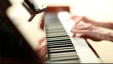 Playing piano: practicing scales Stock Footage 10678334