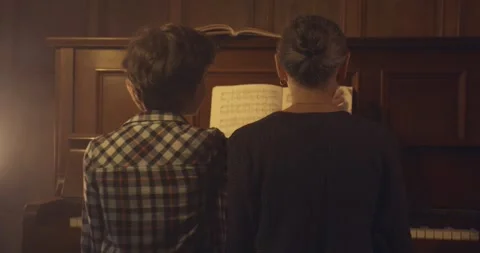 Playing piano together 動画素材 285154808