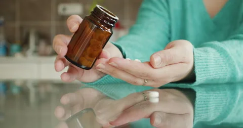 Playing With Pills At Home Stock Footage 237593273