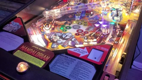 Playing a pinball machine Video stock 205732284