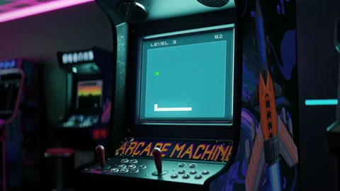 Playing the pixel classic old snake game in the old-school arcade lounge Video stock 233660229
