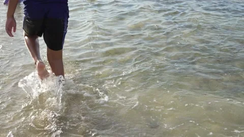 Playing plastic ball on the beach with white sand Stock Footage 221137362