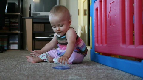 Playing with plastic container Stock Footage 473926