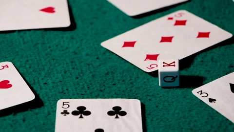 Playing poker, dice falling on the table Stock Footage 147948008
