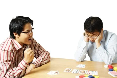 Playing poker Stock Photos