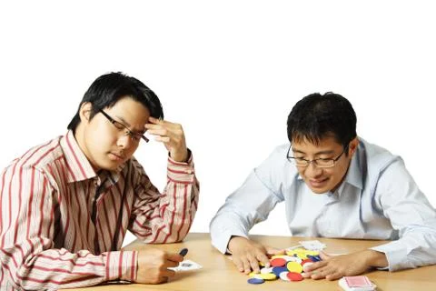 Playing poker Stock Photos