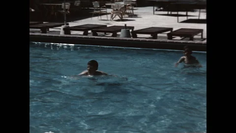 Playing in the Pool 1960 Stock Footage 220092504