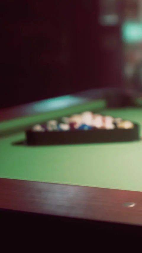Playing pool at a bar with friends during a night out in the city Stock Footage 342344934