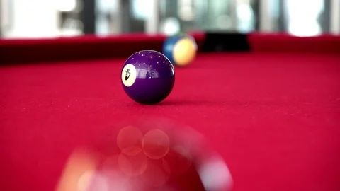 Playing the pool-billiard game on red baize table. This is sports. Stock Footage 83703888