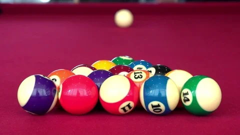 Playing the pool-billiard game on red baize table. This is sports. Stock Footage 83703960