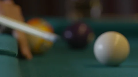 PLAYING POOL IN A DIVE BAR IN SLOW MOTION Stock Footage
