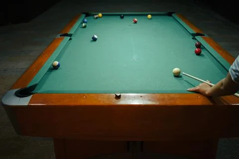 Playing pool in a night pub Stock-Fotos