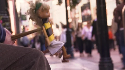 Playing puppet on a street Stock-Footage 88032735