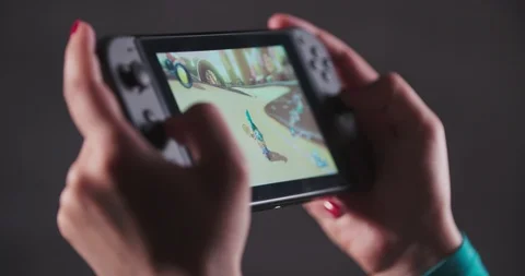 Playing racing games on a console 스톡 동영상 111004802