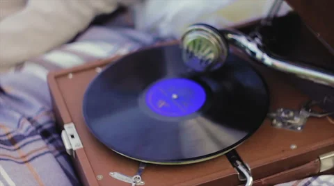 Playing Record Old Gramophone on Lawn Near House Stock Footage 64524238