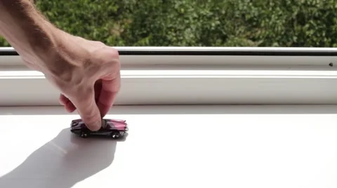 Playing red toy car Видео 66755794
