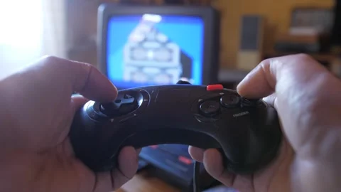 Playing with retro vintage  sega mega drive genesis controller 4k Stock-Footage 284373545