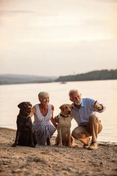 Playing by the river Foto stock