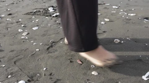 Playing with the sand Stock Footage 240898086