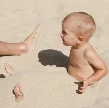 Playing in the sand Stock Photos