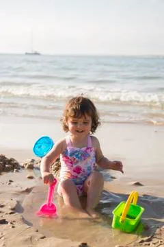 Playing in the sand Stock Photos