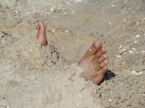 Playing in the sand Foto stock