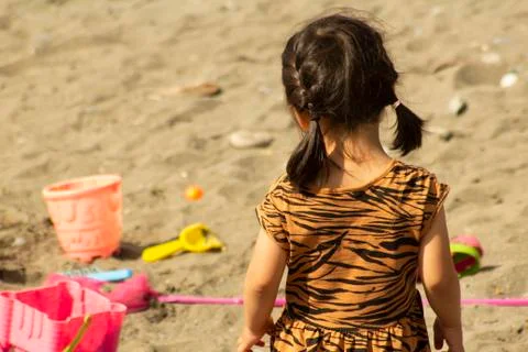 Playing in the sand Stock Photos