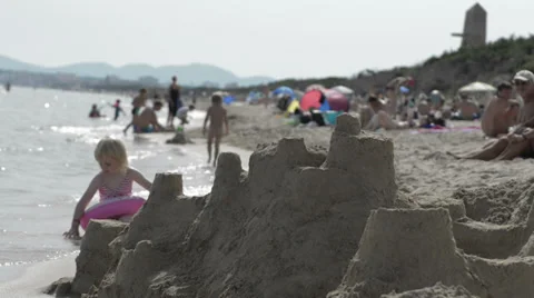 Playing in the sand Playa di Muro Mallorca Stock Footage 32156923