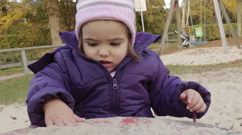 Playing in a sandbox Stock Footage 59920941