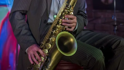 Playing saxophone Stock Footage 112199394