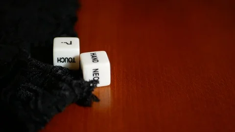 Playing sexual games with cubes. Cubes and panties on the table. Stock Footage 121969022