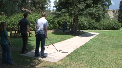 PLAYING SHUFFLEBOARD Stock Footage 33834829