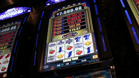 Playing a Slot Machine Stock Footage 33341666