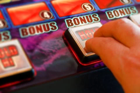 Playing the slots Stock Photos