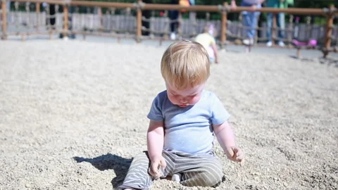 Playing with small stones Stock Footage 136977585