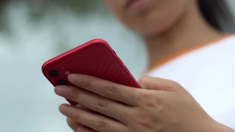 Playing with smart phones Stock Footage 155364362