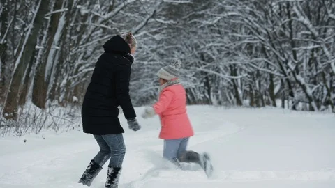 Playing With Snow in the Park Stock Footage 70472720