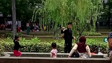 Playing with soap bubbles at Tebet Eco Park, Jakarta, Indonesia, June 13, 2026. Stock Footage 338168435
