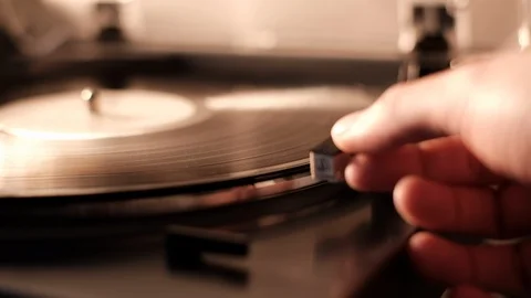 Playing song on the vinyl record player in the evening Stock Footage 101340330