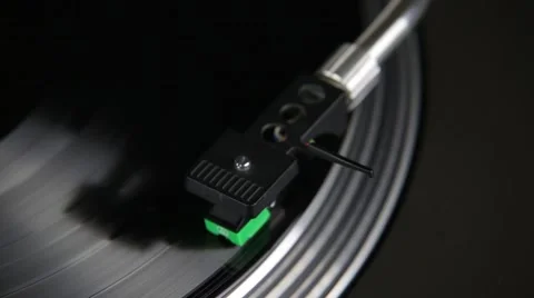 Playing spinning gramophone record and needle Stock Footage 48955615