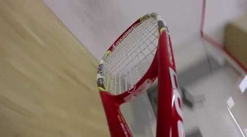 Playing squash. Racket and ball on a court. Stock Footage 58465048
