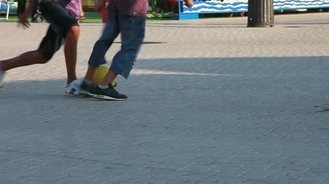 Playing on the street Stock Footage 8599436