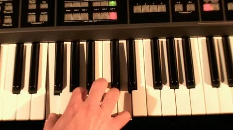 Playing on Synthesizer  3 Stock Footage 10903337