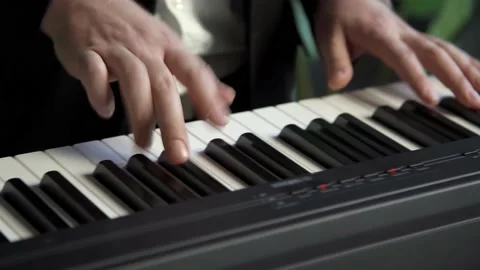 Playing on a synthesizer. close-up. Stock Footage 196155453