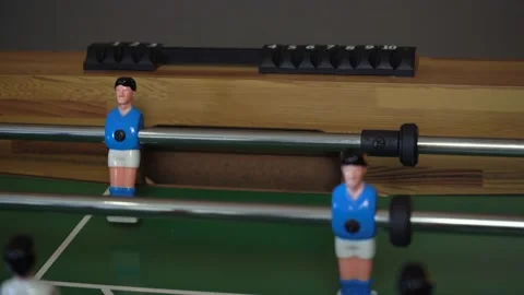 Playing Table Soccer (Kicker) Game Close Up of Ball. Goala Stock Footage 150291341
