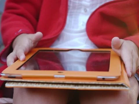 Playing tablet pc Stock Photos