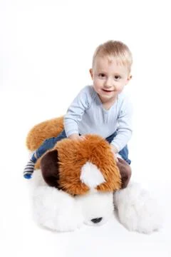 Playing with teddy bear Stock Photos