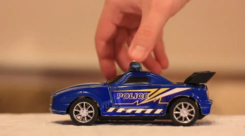 Playing with toy car Stock Footage 34868418