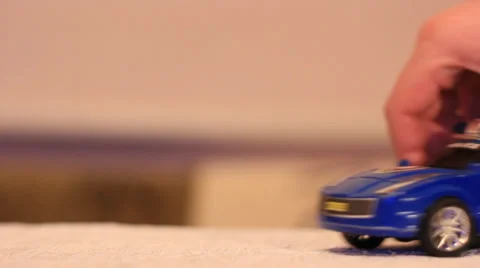 Playing with toy car Vidéo 34868440