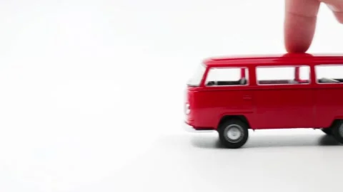 Playing with a toy car on white  background Stock Footage 171240962
